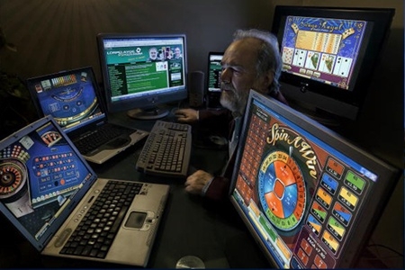 internet onling gambling dangers addiction image picture computers screens light